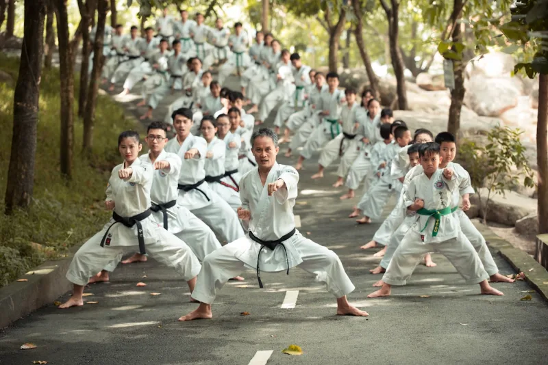Women supporting each other at a martial arts community event