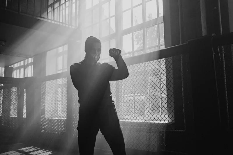 Beginner practicing shadow boxing as part of a martial arts workout