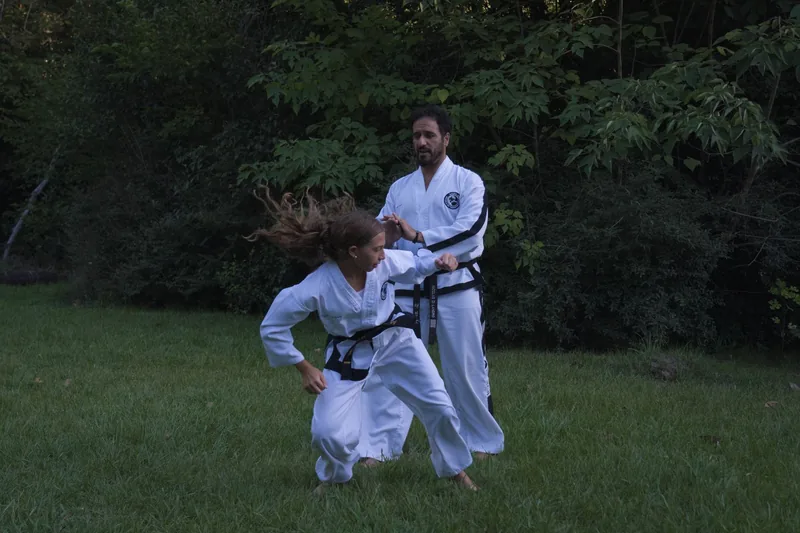 HapKiDo self-defense techniques including a standing joint lock and control