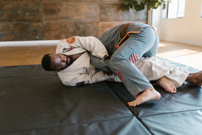 Martial arts students drilling ground defense, part of HapKiDo self defense training